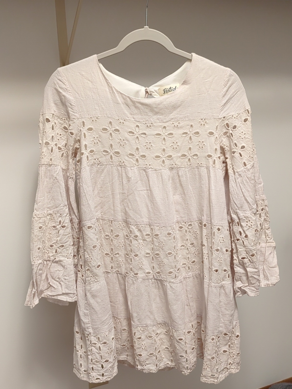 Listicle Eyelet-Tiered Long Sleeve Tunic Dress in Pale Pink